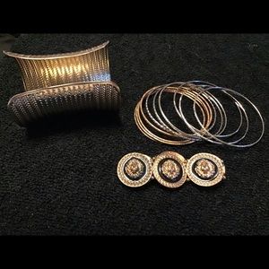 Gold colored bangles.